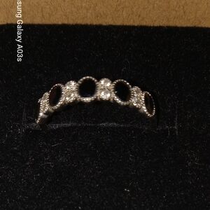Elegant Silver Ring with Black Accents